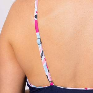 A closeup of the adjustable straps on The Happily Eva After Collection Reversible Heide Swimsuit