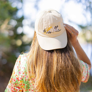 Eva Amurri wears The Happily Eva After Collection Team Lake Hat in Bar Harbor, Maine