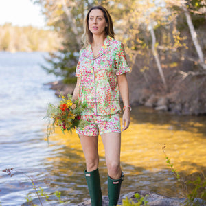 Eva Amurri stands in a lake whilst wearing The Happily Eva After Collection Jordan Pond Pajamas