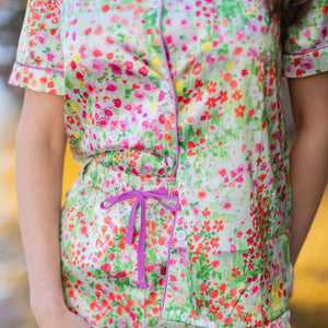 Eva Amurri stands in a lake whilst wearing The Happily Eva After Collection Jordan Pond Pajamas