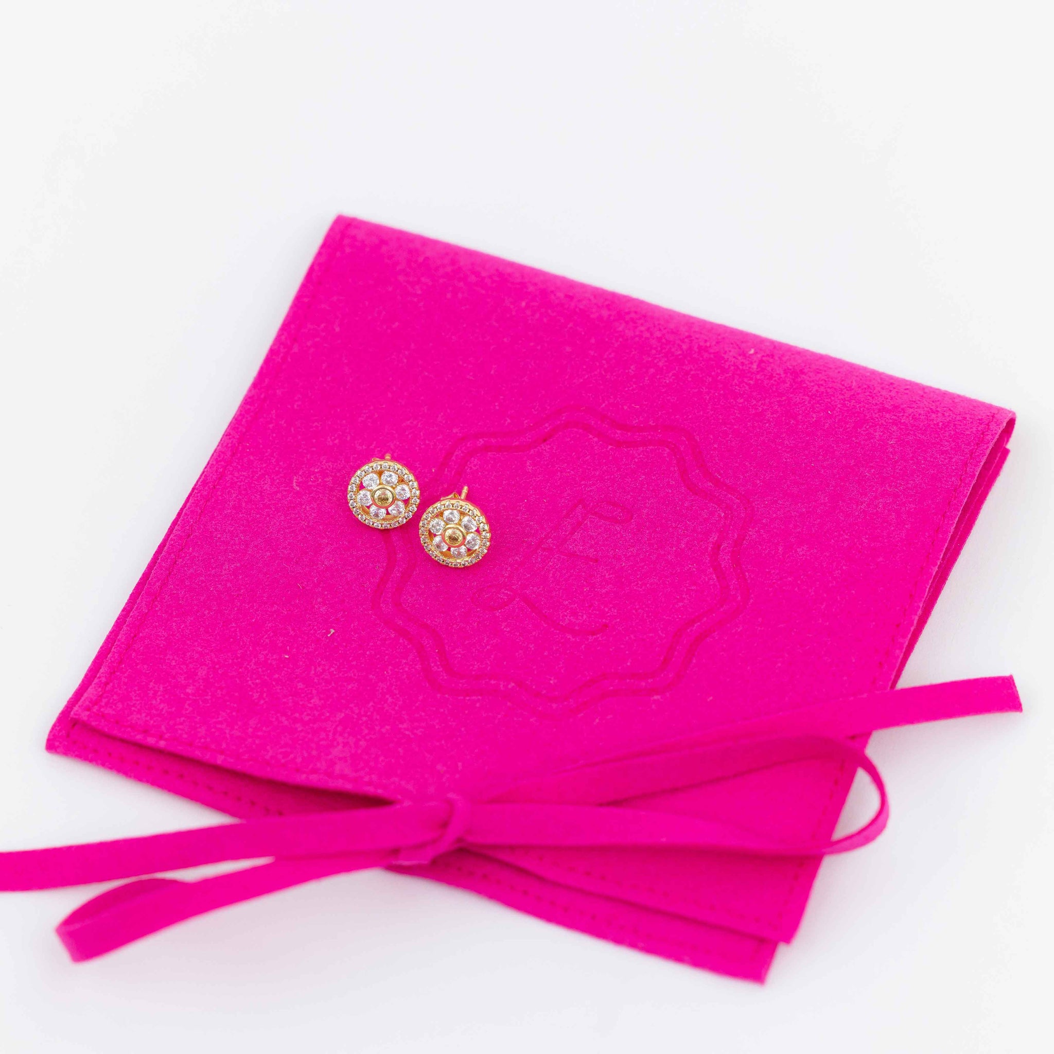 The Happily Eva After Collection Daisy Studs come with a reusable suede pouch